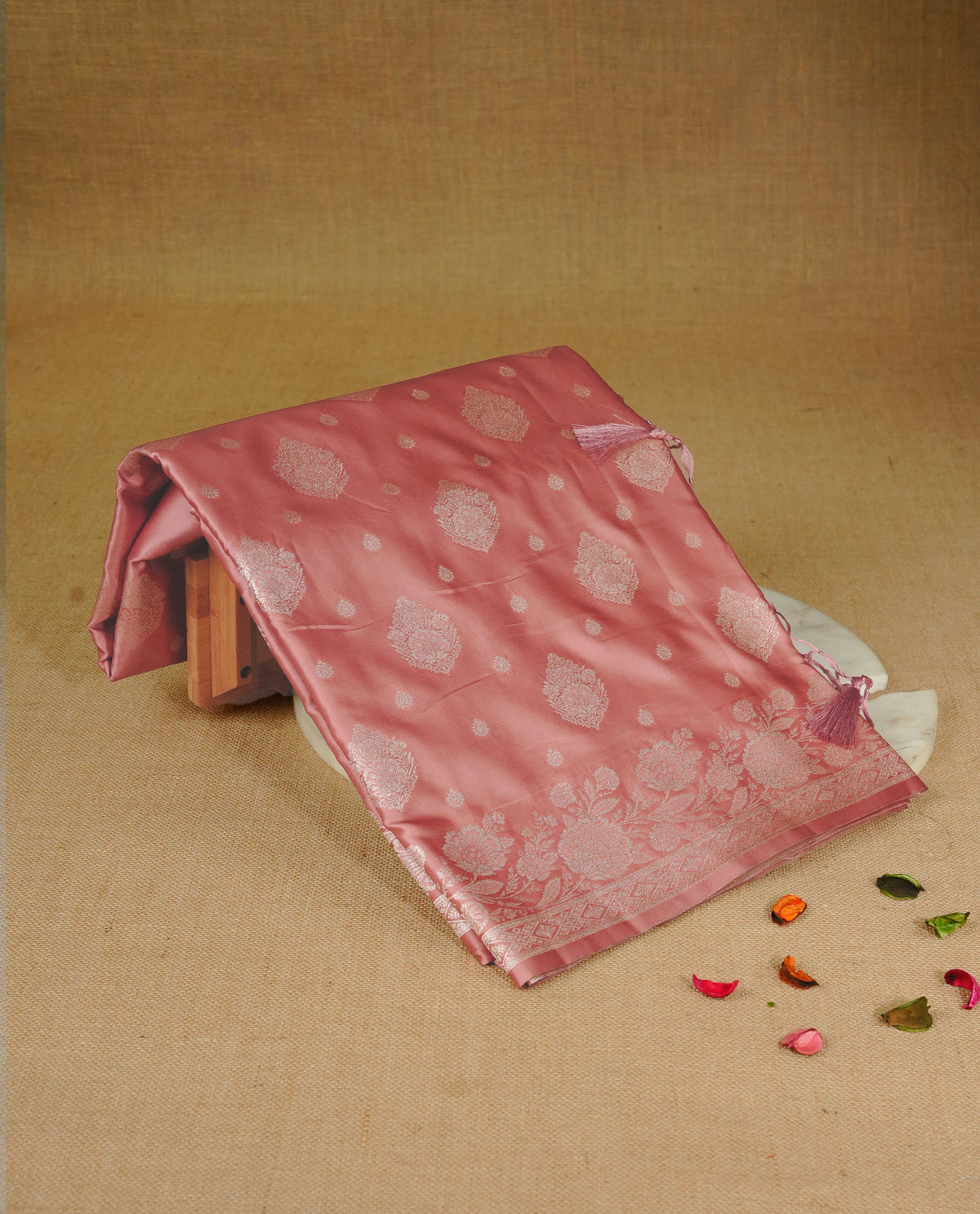 Peach colour Mulberry silk saree featuring light gold small buttas & big motifs onbody, complemented by self colour with Light gold zari floral Border, comes with matching blouse piece.