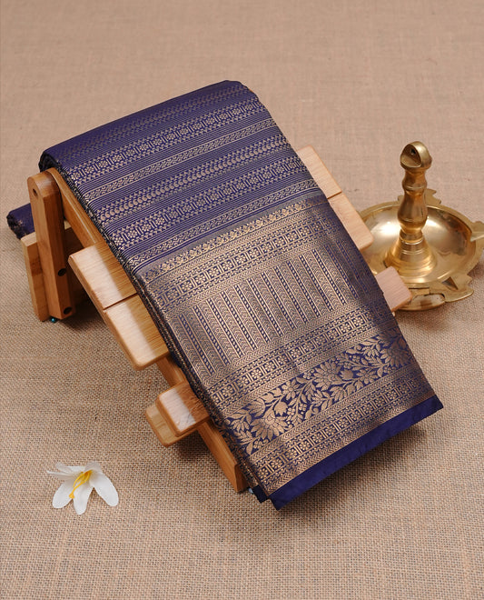 Navy Blue Semi Wedding Silk Saree featuring Gold Zari stripes with Motifs On body, Complemented with traditional zari with Self colour border, paired with matching blouse piece.
