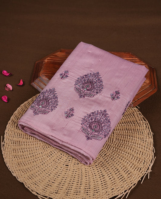 Pink colour semi tusser silk saree featuring Floral thread embroidery across body, without border and paired with matching blouse.