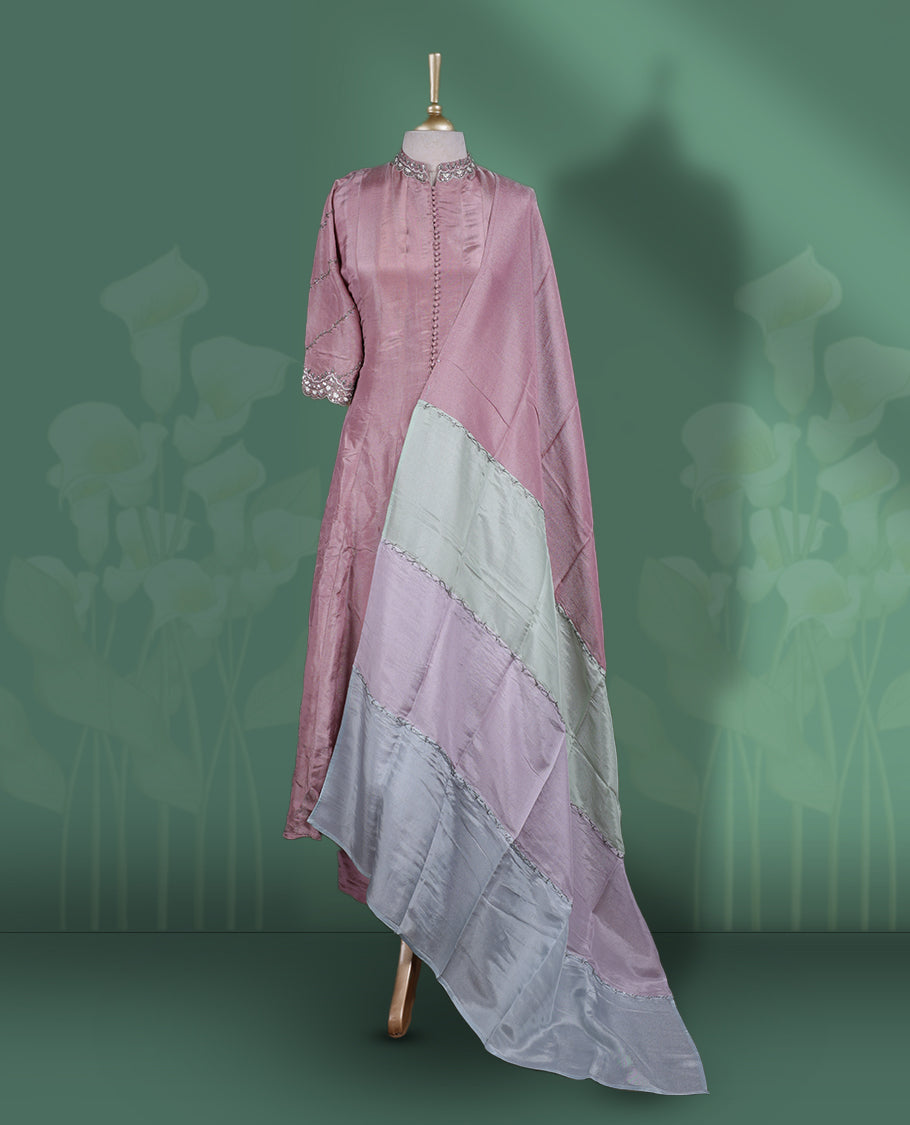 Onion pink colour Anarkali Suit featuring cut bead, pearl, and sequin work on the neckline and sleeves & Paired with a soft tri tone dupatta with plain bottom, perfect for festive and formal occasions.