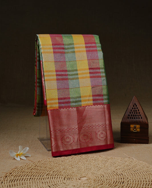 Green, Pink & Yellow Tissue Saree featuring Multi colour Check Design on body, complemented by contrast Red colour with Gold zari border, paired with matching blouse piece.