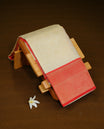 Cream Colour Semi Soft Silk Saree Featuring Gold zari Box With motifs Pattern On Body, Highlighted  by contrast Red border with Gold zari, paired with matching blouse piece.