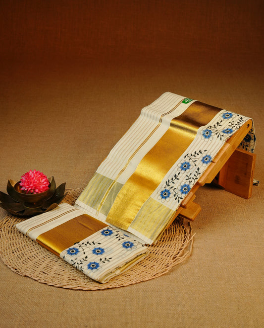 Cream colour cotton set mundu featuring Gold zari strips on body & Floral print Kasav border.
