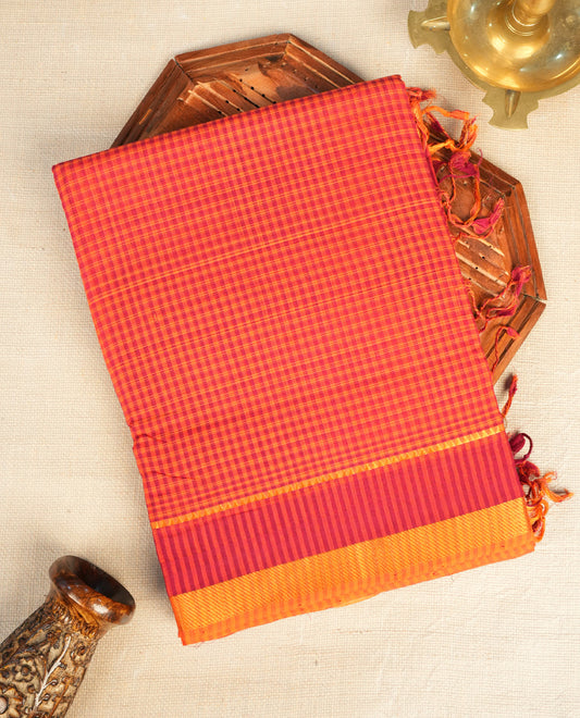 Orange  Mangalagiri cotton saree featuring elegant Maroon Checks  Pattern On Body, Complemented by Contrast Striped Pattern , Gold  zari border & Contrast  pallu, Paired With a matching blouse piece.