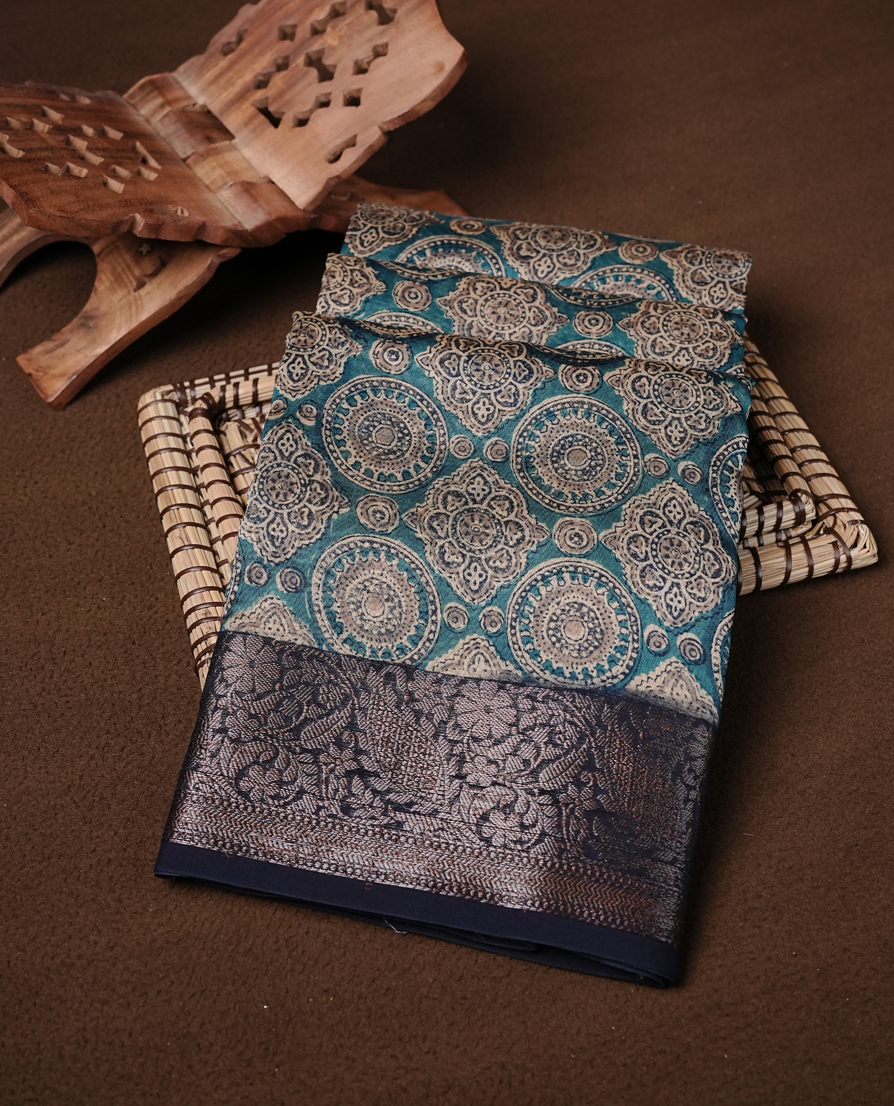 Blue colour Chanderi silk saree featuring Print on body, complemented by Dark Blue colour with Antique zari border, paired with matching blouse piece.