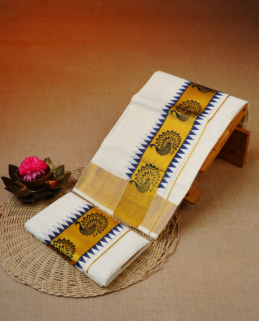 Cream colour cotton set mundu featuring Gold kara with Blue temple & peacock print.