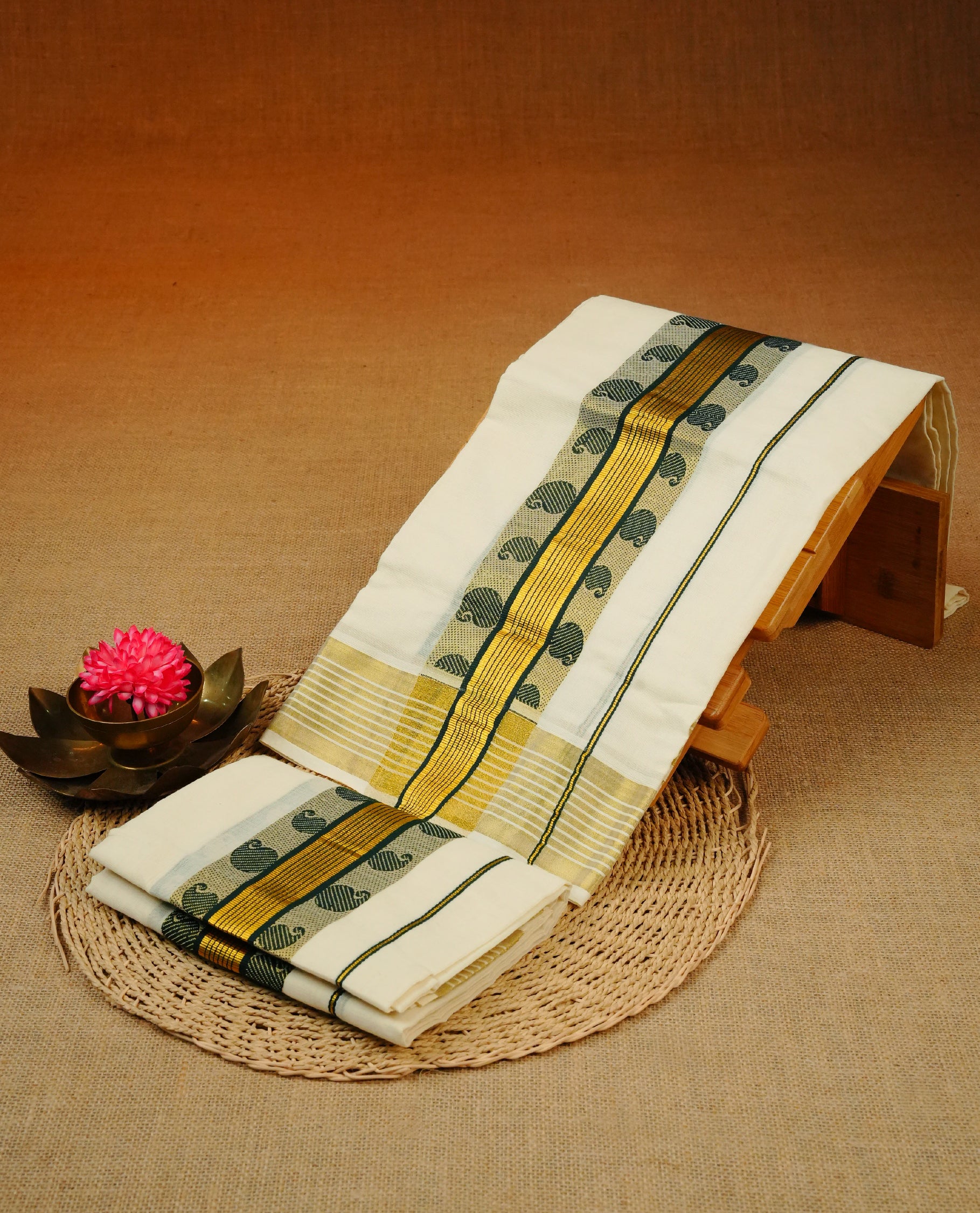 Cream colour cotton Set Mundu With Plain body, enhanced gold zari with designed kara.