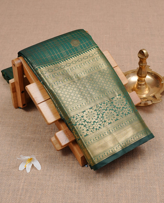 Green Semi Wedding Silk Saree featuring Gold Zari Check with Motifs On body, Complemented with traditional zari with Self colour border with, paired with matching blouse piece.