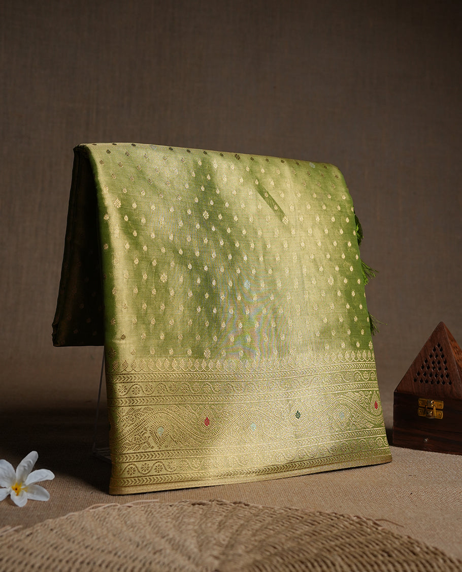 Green & Gold double shade colour tissue banaras silk saree featuring antique gold zari motifs on the body with rich traditional zari border and pallu, paired with a matching blouse piece.
