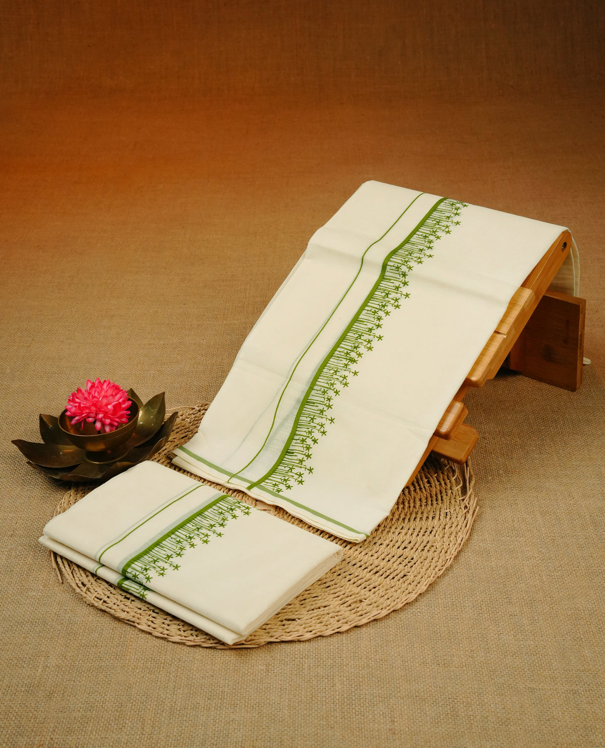 Cream colour cotton Set Mundu With Plain body, enhanced with Green with Printed kara.