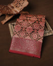 Green colour Chanderi silk saree featuring Print on body, complemented by Maroon colour with Antique zari border, paired with matching blouse piece.