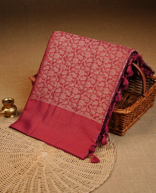 Red  colour pure tussar silk saree featuring light gold zari floral kodi work on the body, a plain border & grand pallu, Paired With  a matching blouse piece.