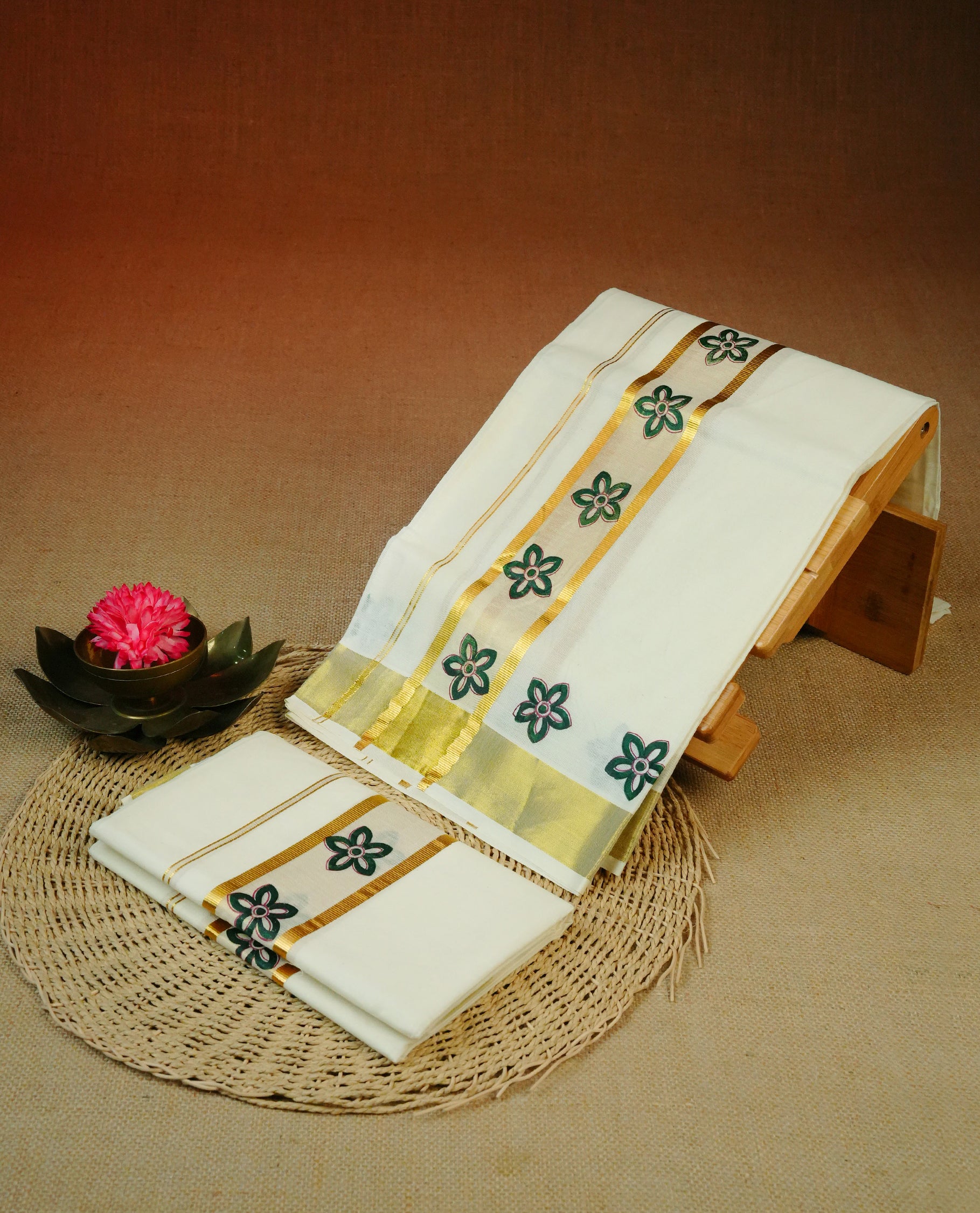 Cream colour cotton Set Mundu With Plain body, enhanced with Gold zari & Green colour Floral printed kara.