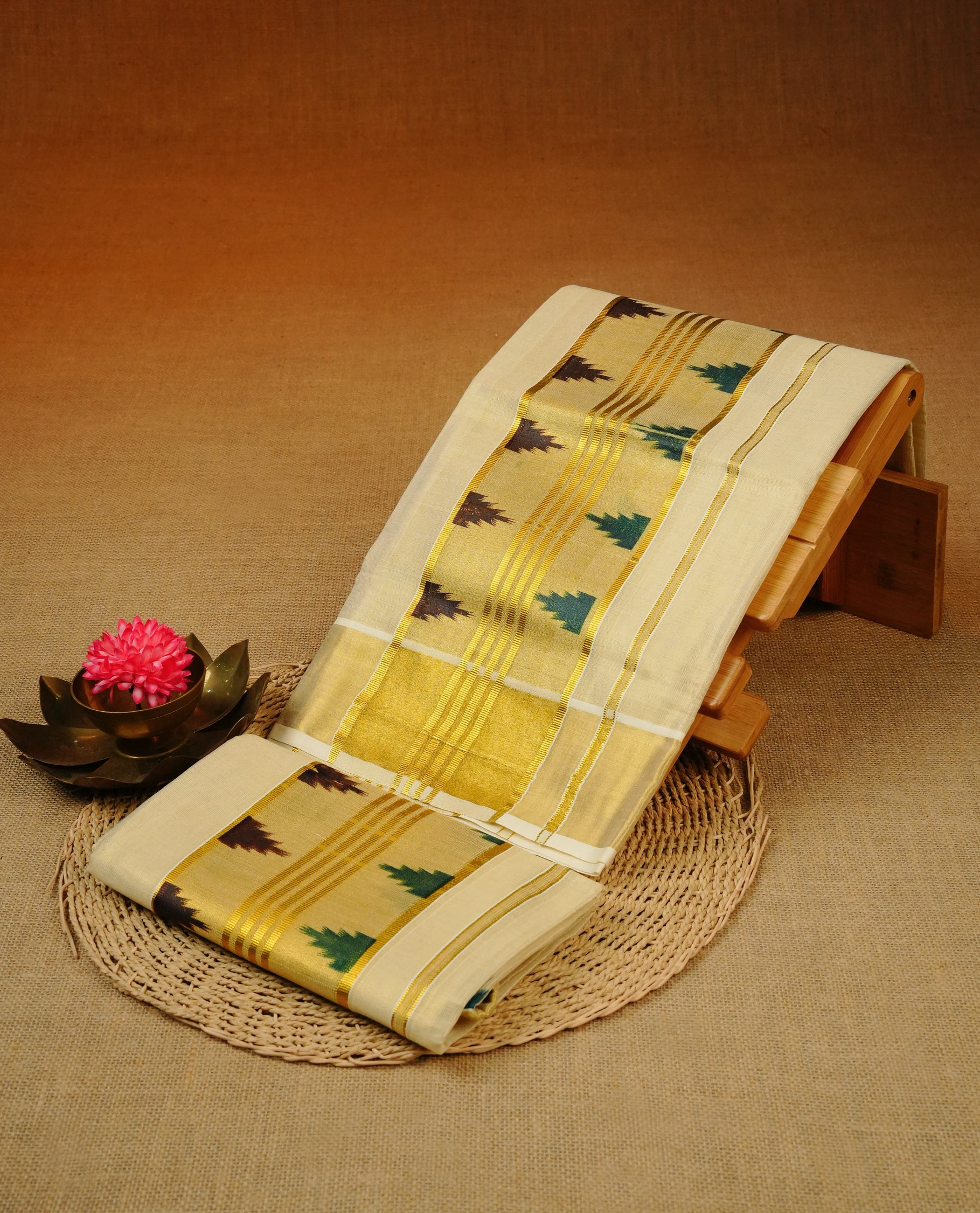 Cream Colour tissue set mundu featuring a Plain body, enhanced with elegant Green & Dark Brown  Temple Prints On  gold zari kara.
