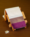 Off White colour soft silk saree with contrast Purple border.
