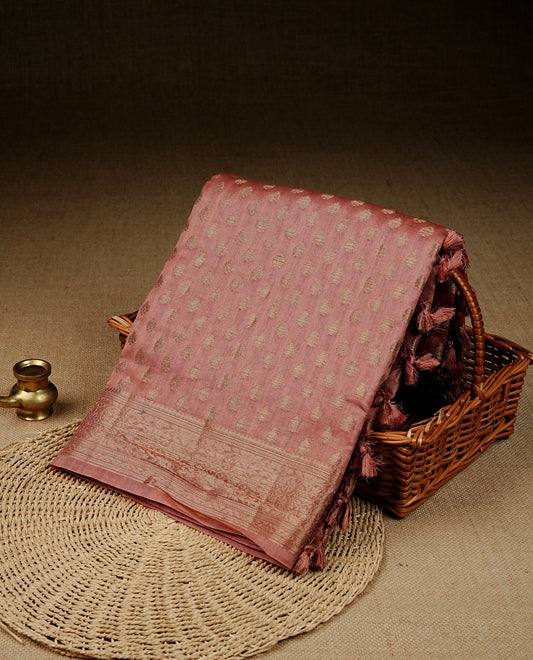 Mauve colour banaras saree featuring Gold zari buttas on body, complemented gold zari on self colour border, comes with matching blouse piece.