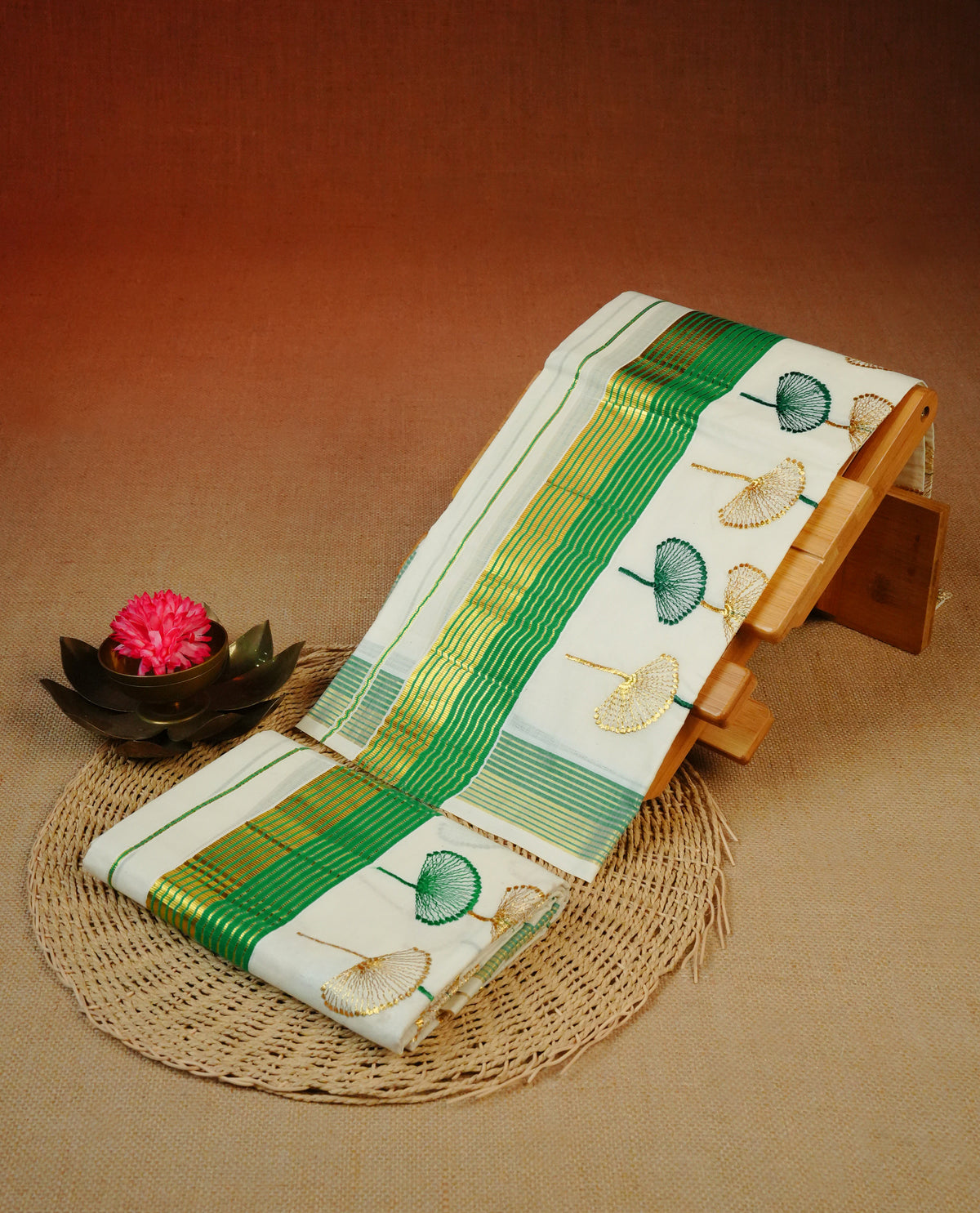 Cream colour cotton Set Mundu With Plain body, enhanced with Green & Gold kasavu with Embroidery worked  kara.
