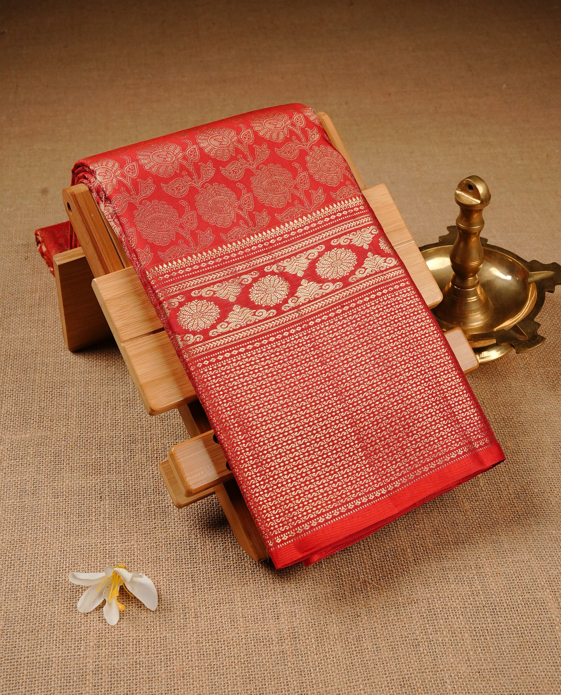 Red Colour Pure Kancheepuram Silk Saree Featuring Gold Zari Floral  Pattern on the Body, Highlighting a Traditional Gold Zari Border, Paired with a Matching Blouse Piece.