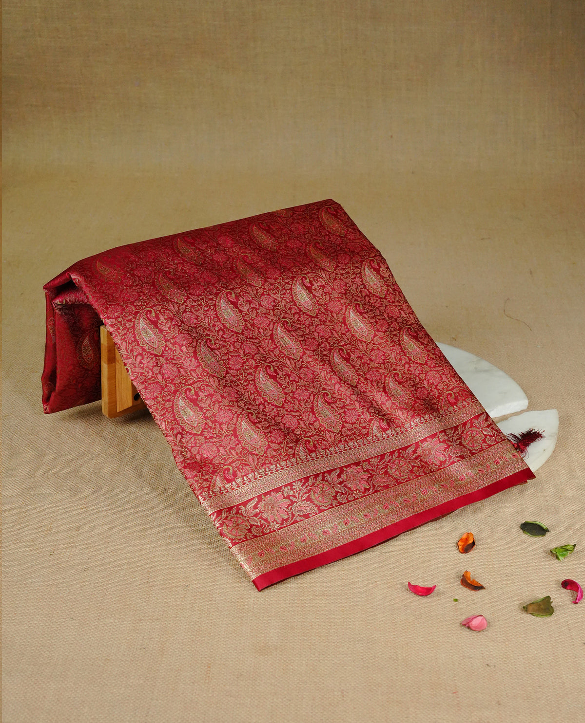 Brown colour Bulberry silk saree featuring gold zari Mango & floral kodi pattern across body, complemented by self colour border with gold zari work, comes with matching blouse piece.