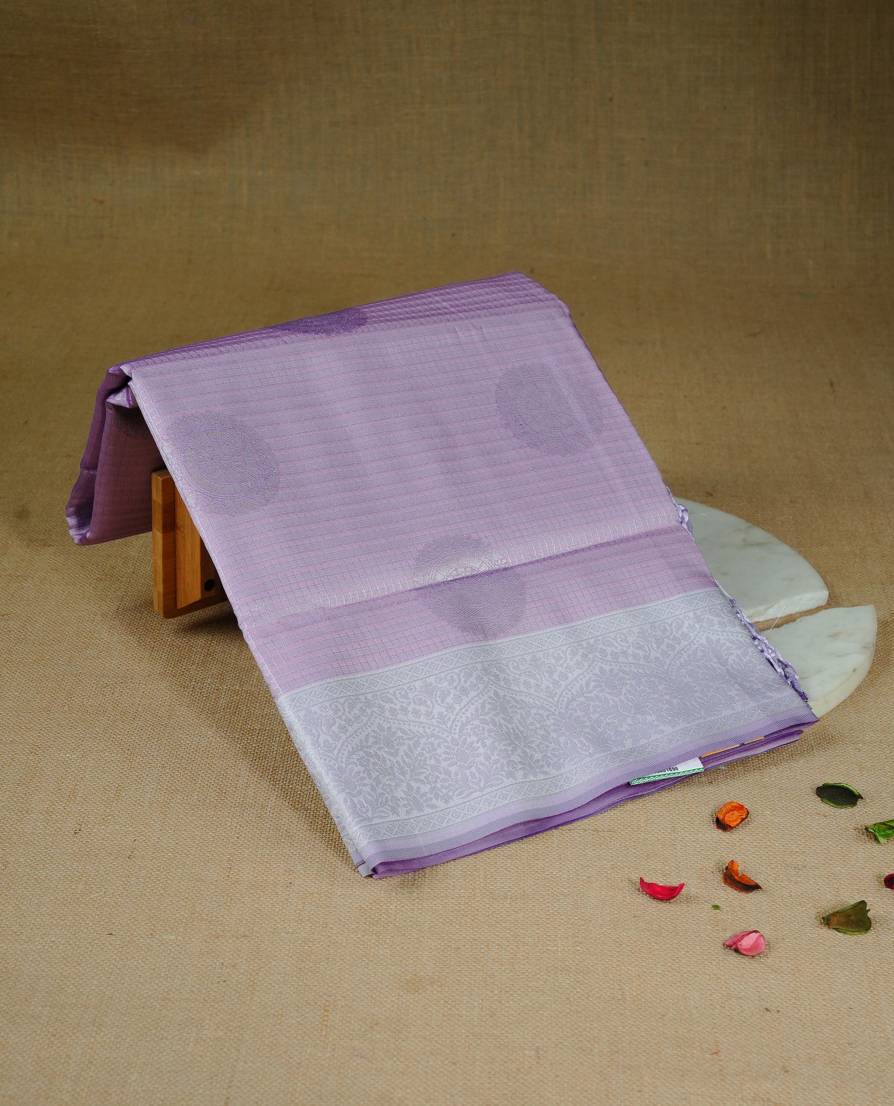 Pink & lavender colour semi silk saree featuring Silver zari Small check pattern & motifs on body, complemented by contrast lavender colour with silver zari border, comes with matching blouse piece.