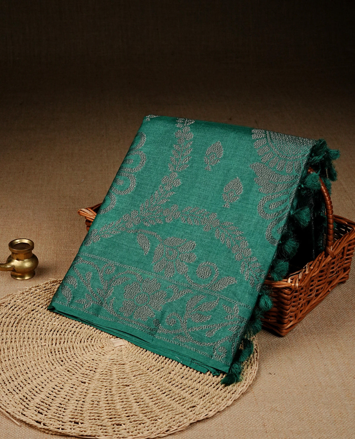 Green colour banaras saree featuring Antique zari kodi pattern on body, complemented by borderless & comes with matching blouse piece.
