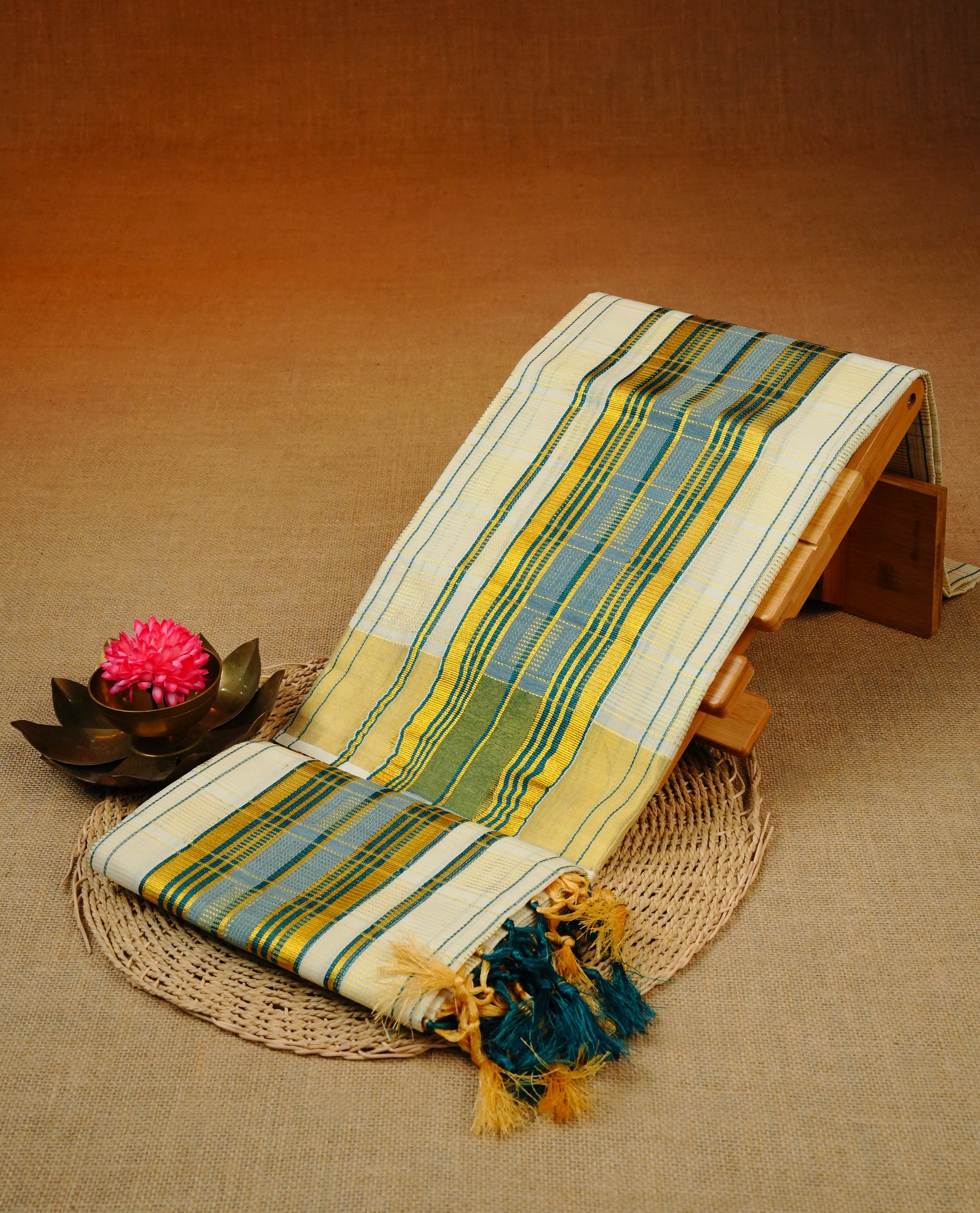 Cream colour Cotton set mundu With Gold zari Checks on body, enhance gold zari  with Teal colour kara.