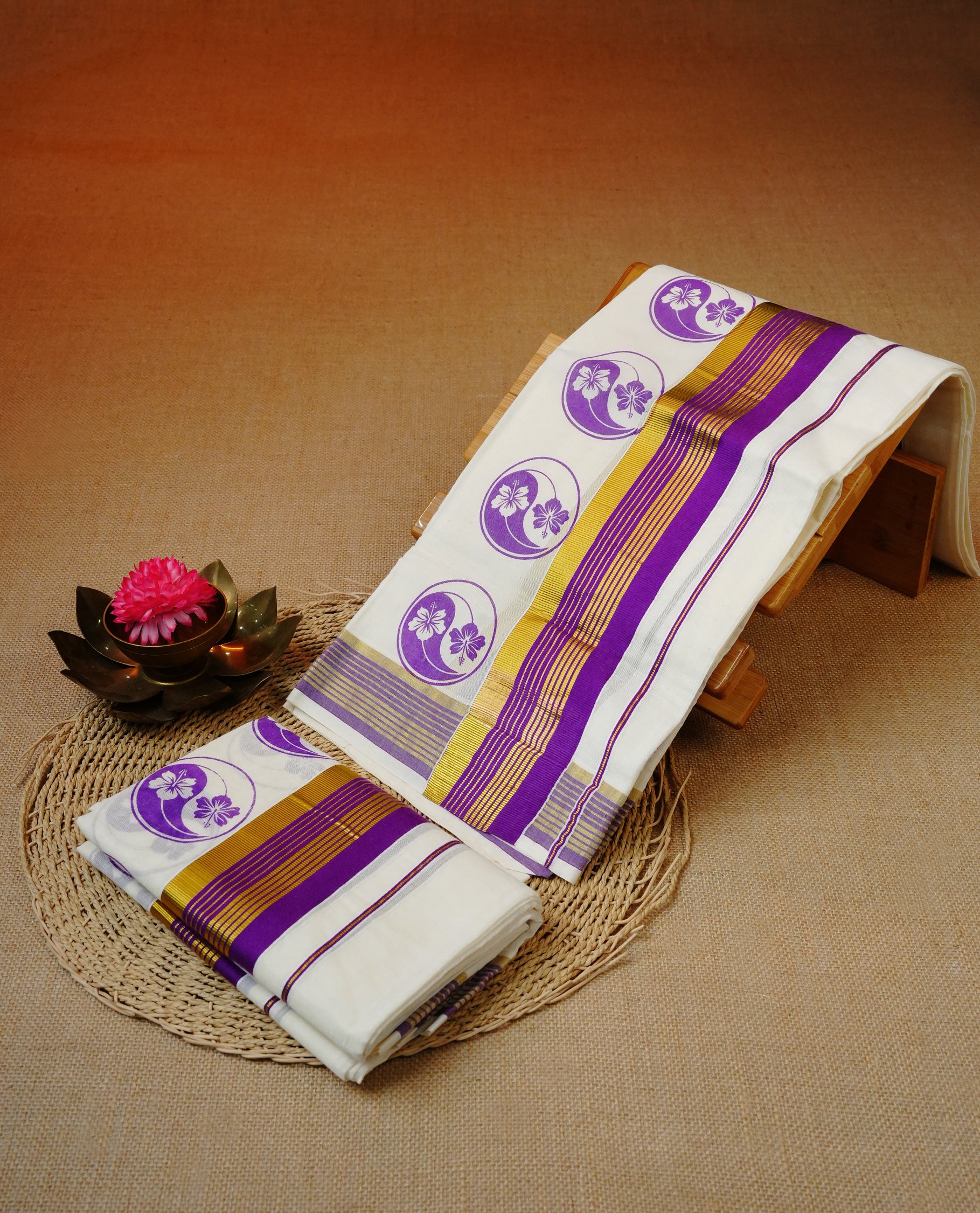 Cream colour cotton set mundu featuring Purple Print with gold kasav kara.