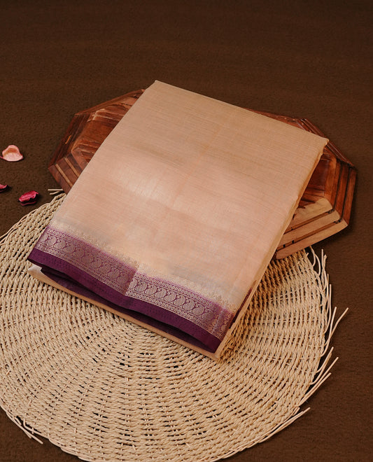 Cream colour Tussar silk saree Featuring Elegant Plain body, complemented by Contrast Maroon colour with gold zari border, paired with matching blouse piece.