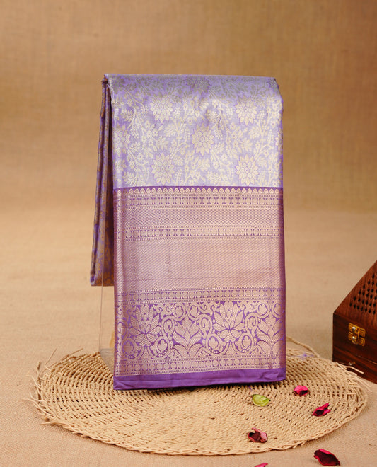 Lavender & Silver colour Double shade Semi tissue silk saree featuring self color Floral pattern on body, Contrast Lavender  colour with Fancy border, paired with matching.