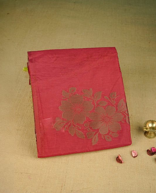 Maroon colour semi linen saree with elegant gold zari floral motifs across the body, complemented by a contrast green colour with grand gold zari pallu and a borderless design, paired with a matching blouse piece.