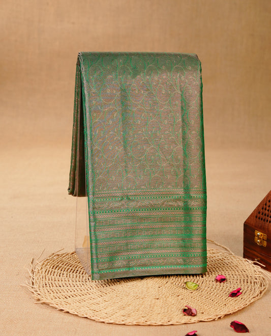 Green & Gold colour Double shade Semi tissue silk saree featuring self color kodi pattern on body, self colour with Fancy border, paired with matching.