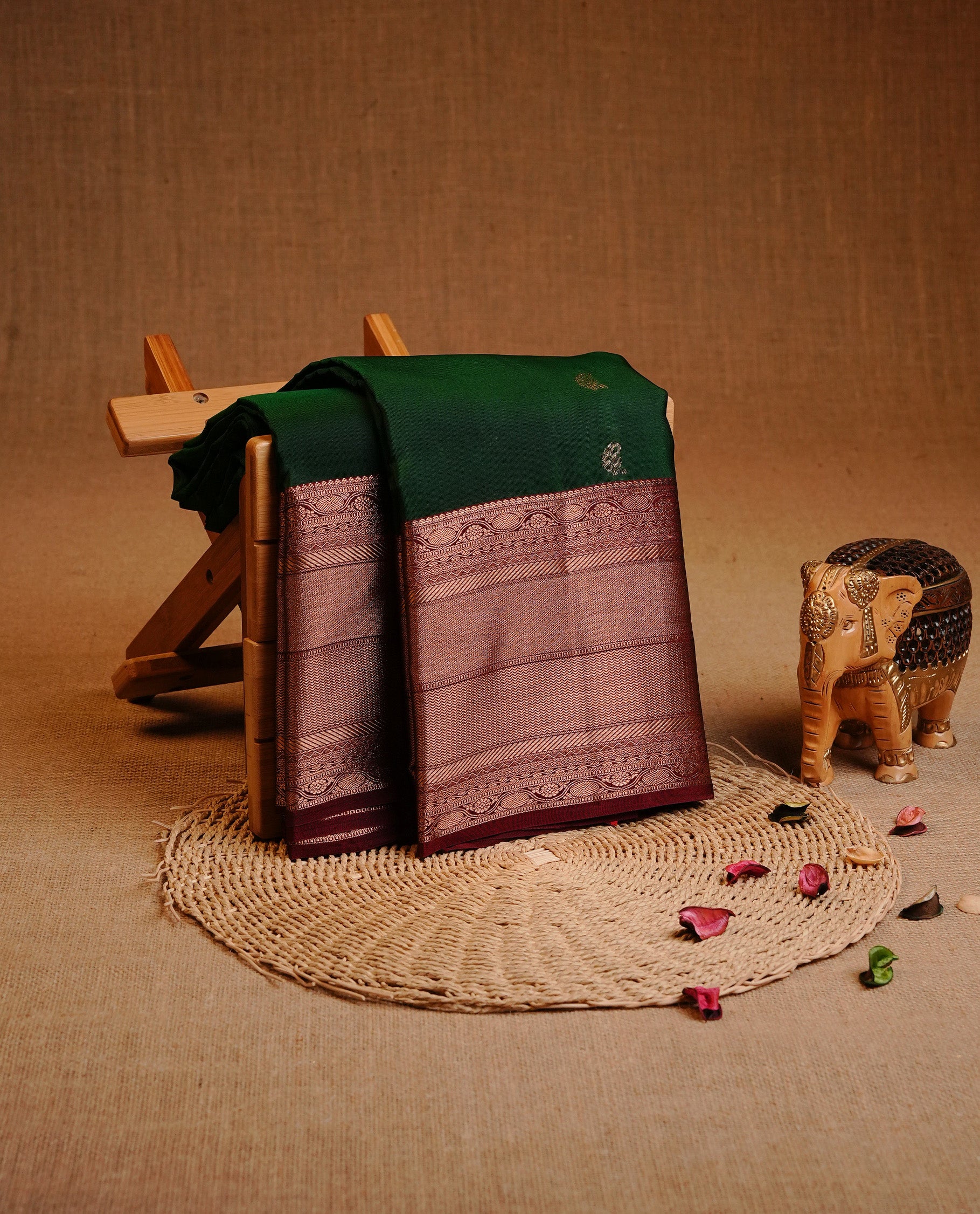Green Colour Traditional Kancheepuram Silk Saree Featuring Gold Zari  Motifs on the Body, Complemented by a Contrast Maroon Colour Gold Zari Traditional Border and Pallu, Paired with a Matching Blouse .