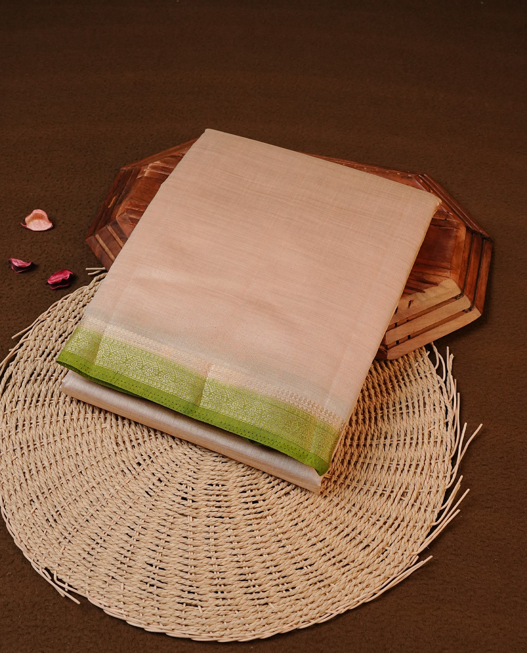 Cream colour Tussar silk saree Featuring Elegant Plain body, complemented by Contrast Light green colour with gold zari border, paired with matching blouse piece.