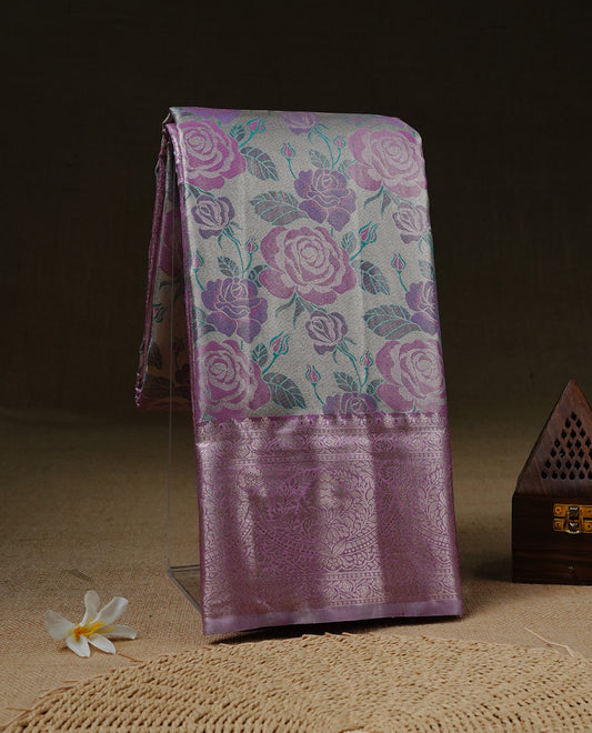 Light Gold Tissue silk saree featuring Pink colour floral design on body, complemented by Pink colour with Light gold zari border, paired with matching blouse piece.