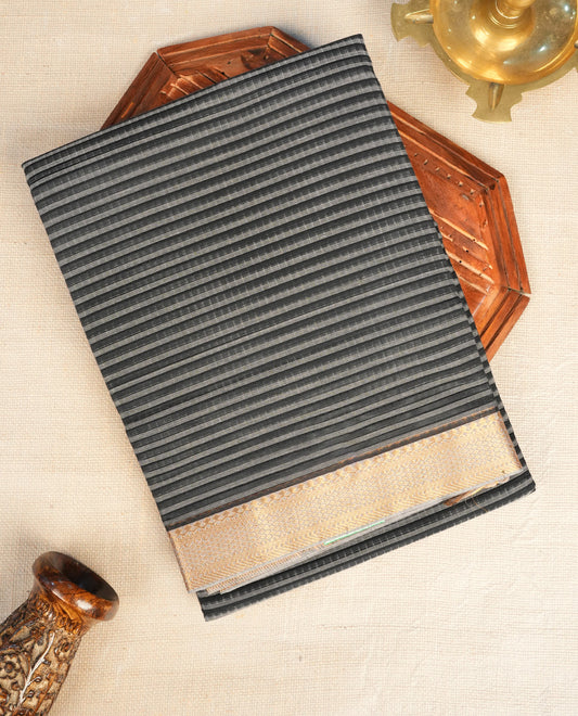 Grey  Colour Mangalagiri cotton saree featuring elegant Black stripes Across The Body , a Two Inch Gold  zari border & Gold Zari Pallu, Paired With a matching blouse piece.