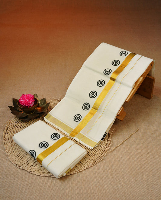 Cream colour cotton set mundu featuring Kasavu Kara with black circle print.