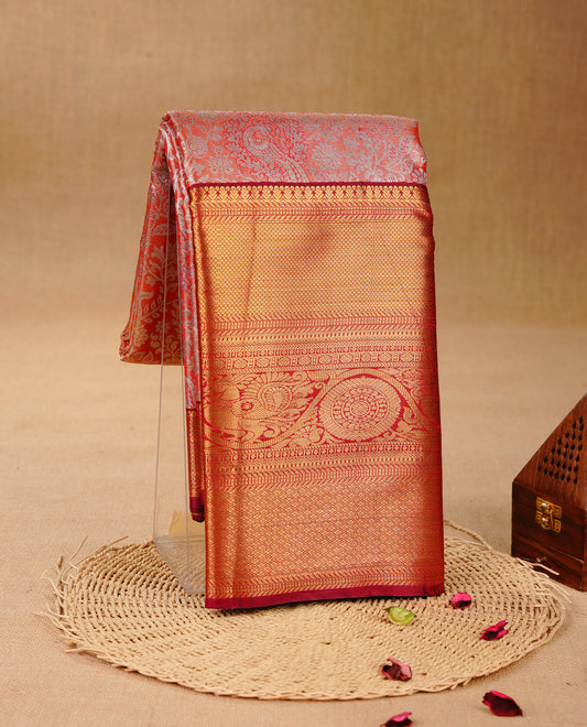Orange & Gold colour Double shade Semi tissue silk saree featuring Silver zari Floral pattern on body, Contrast Maroon colour with Fancy border, paired with matching.