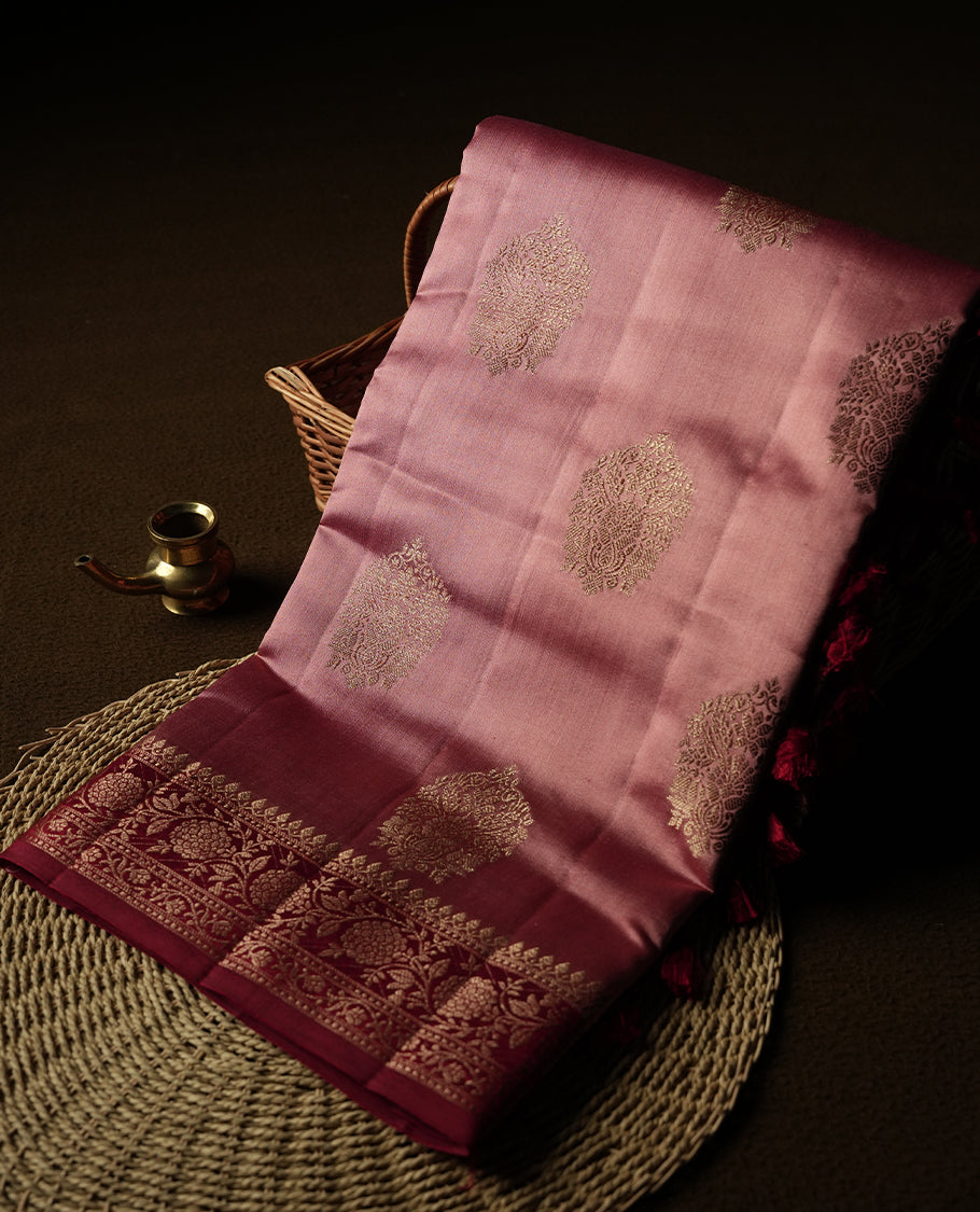 Coral Pink Colour Banaras Soft Silk Saree with Gold Zari Textured Oval Buttas, Simple Decorative Pallu Border, Grand Pallu with Ornate Circular and Foliate Motifs in Red and Gold Tones, and Matching Bright Red Blouse.