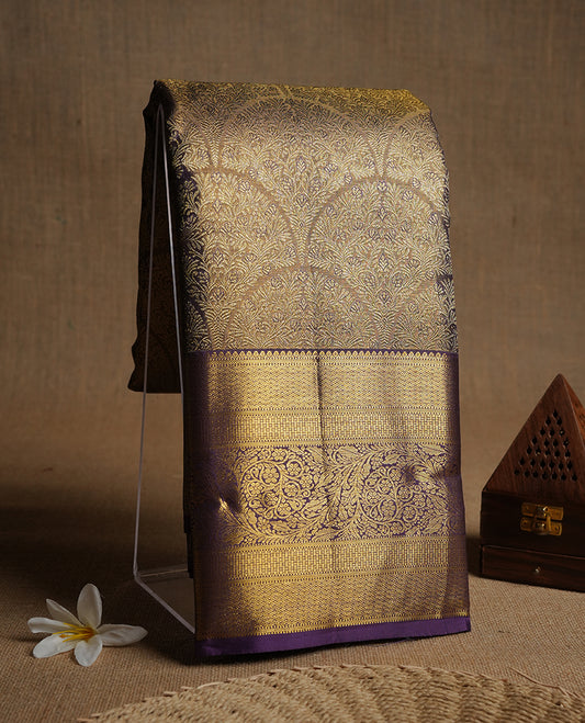 Purple & gold double shade colour kancheepuram tissue silk saree highlighting kodi gold zari pattern body, with contrast Purple colour colour with traditional border and paired with matching blouse.