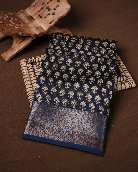 Dark Teal Colour Chanderi Silk Saree Featuring Floral Print On Body, Complemented by Self Colour with Antique Zari Border, Paired With Matching blouse Piece.
