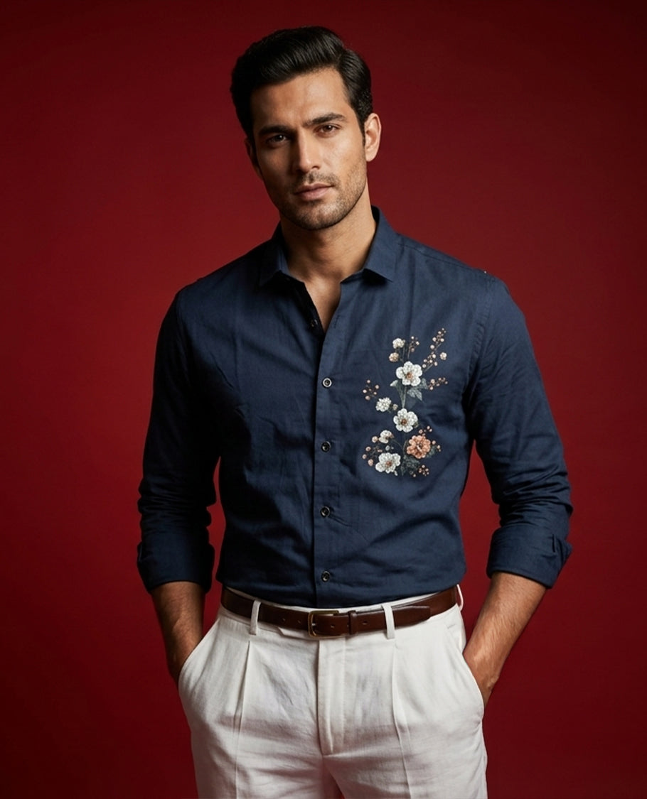 Navy blue colour shirt designed with floral print on body, classic full sleeve.