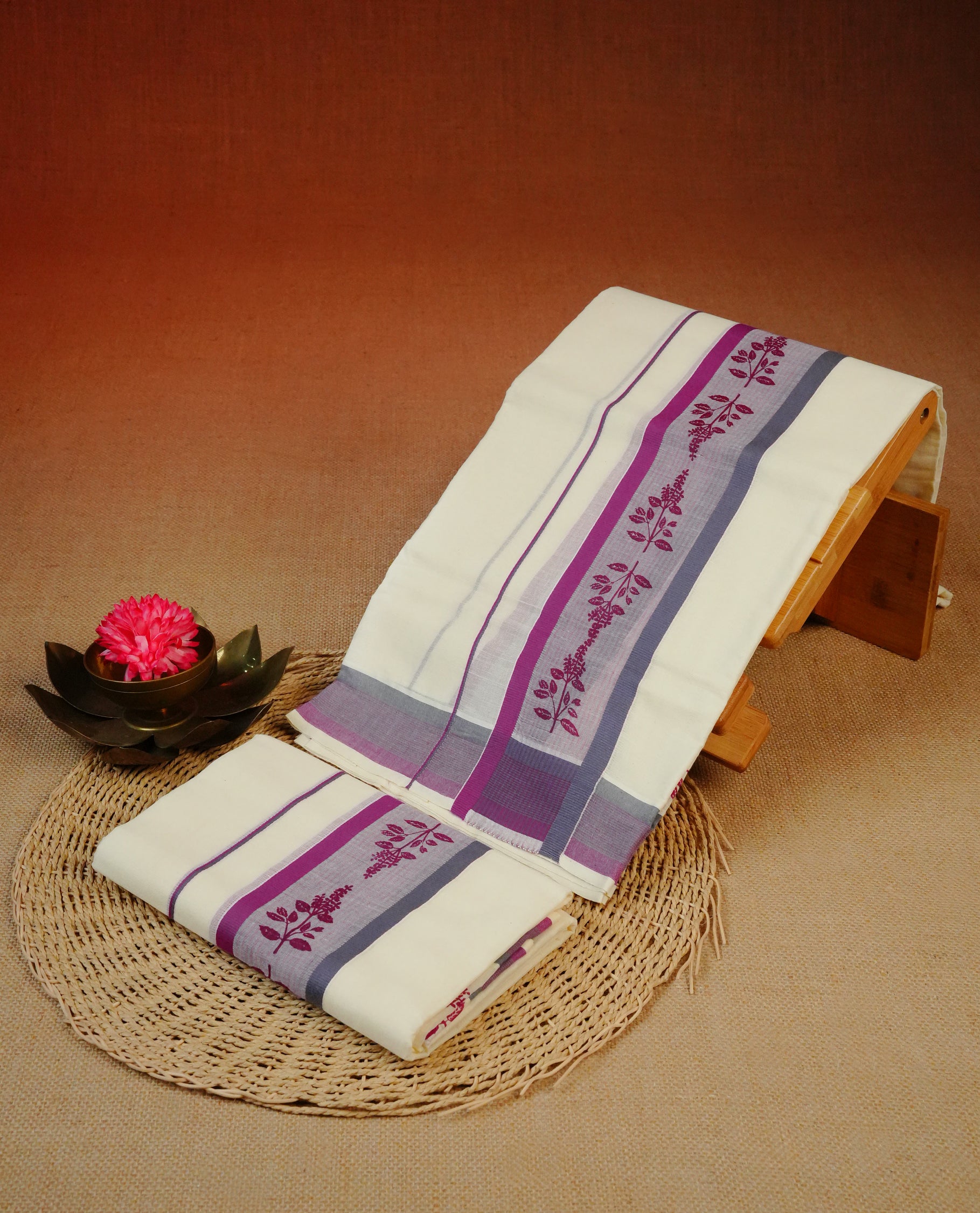 Cream colour cotton set mundu with plain body, featuring Purple & Grey kara with print.