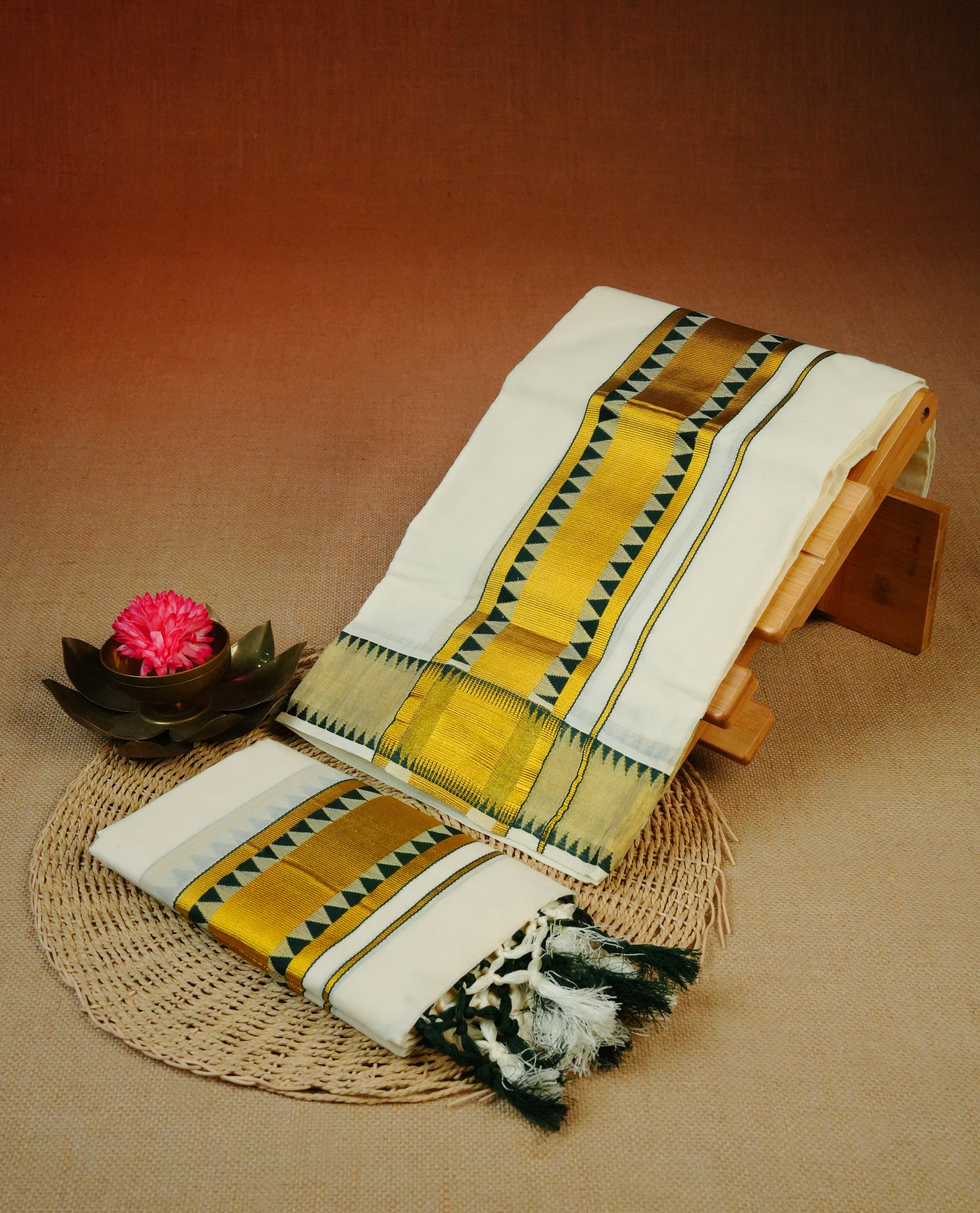Cream colour Cotton set mundu With plain body, enhance gold zari with Green temple design kara.