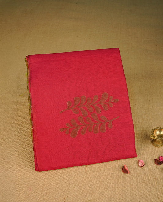 Dark Red colour semi linen saree with elegant gold zari Leaf motifs across the body, complemented by a contrast green colour with grand gold zari pallu and a borderless design, paired with a matching blouse piece.