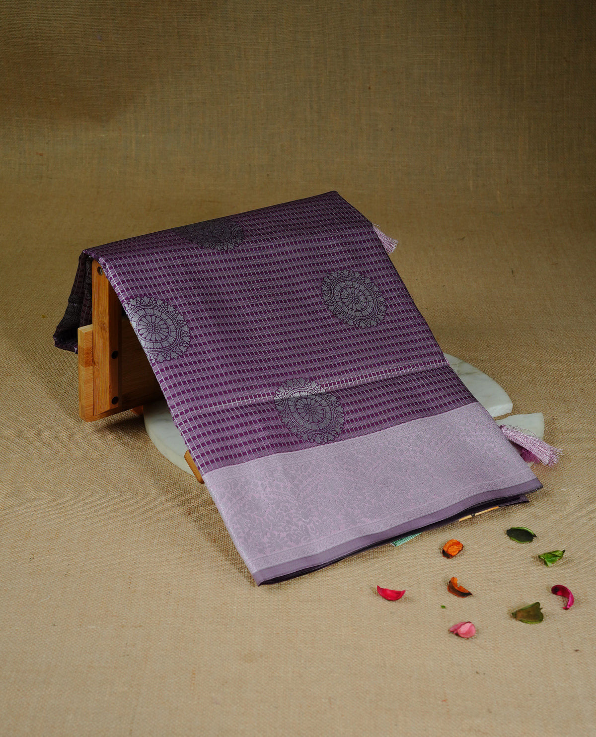 Purple & Pink colour semi silk saree featuring Silver zari Small check pattern & motifs on body, complemented by contrast Pink colour with silver zari border, comes with matching blouse piece.
