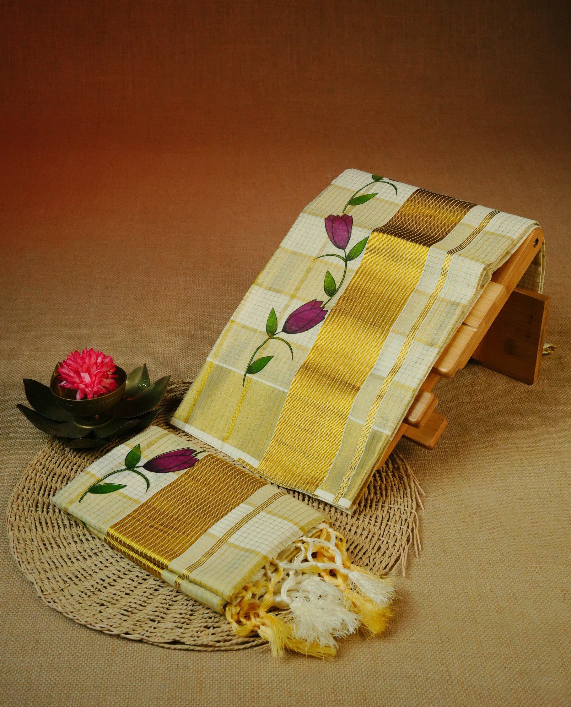 Cream colour cotton Set Mundu With Gold zari checks on body, enhanced with Gold zari & Floral printed kara.
