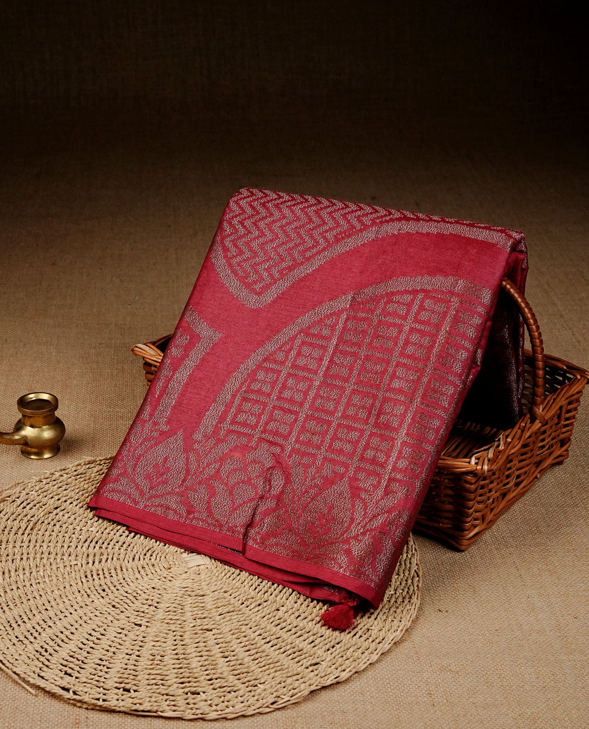 Red colour banaras saree featuring Antique zari kodi pattern on body, complemented by Zari pattern on self colour border, comes with matching blouse piece.