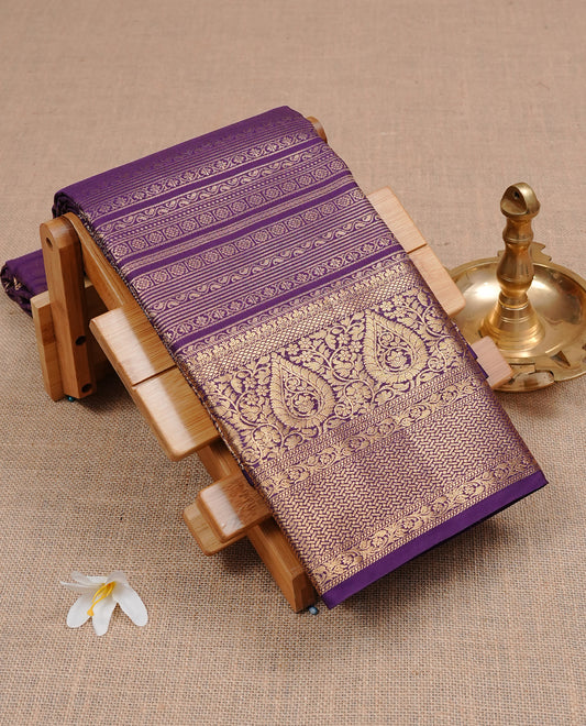 Purple colour Semi wedding silk saree featuring strip pattern on body, complemented by self colour traditional border, paired with matching blouse piece.