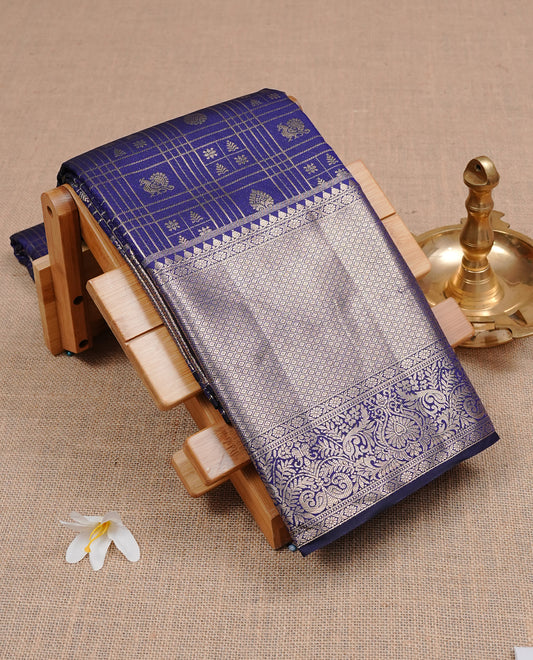 Navy Blue Wedding Silk Saree featuring Gold Zari Check with Motifs On body, Complemented with traditional zari with Self colour border, paired with matching blouse piece.