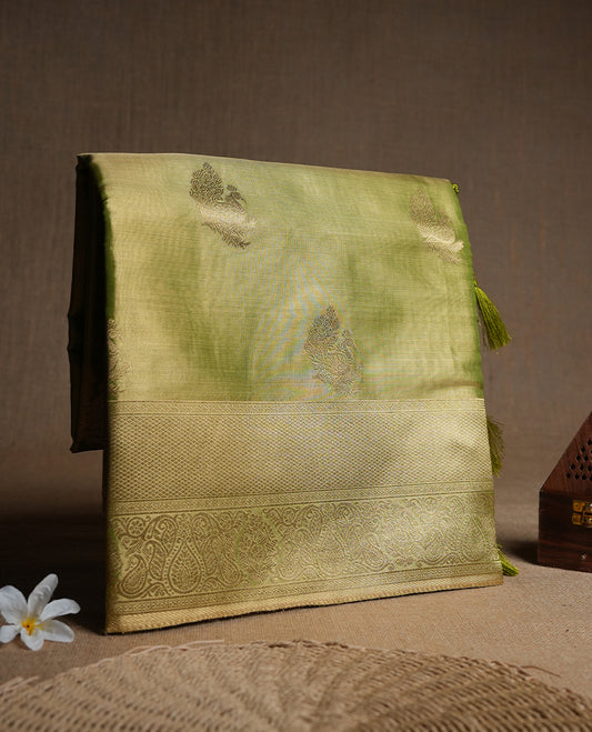 Green & Gold double shade colour tissue banaras silk saree featuring antique gold zari motifs on the body with rich traditional zari border and pallu, paired with a matching blouse piece.